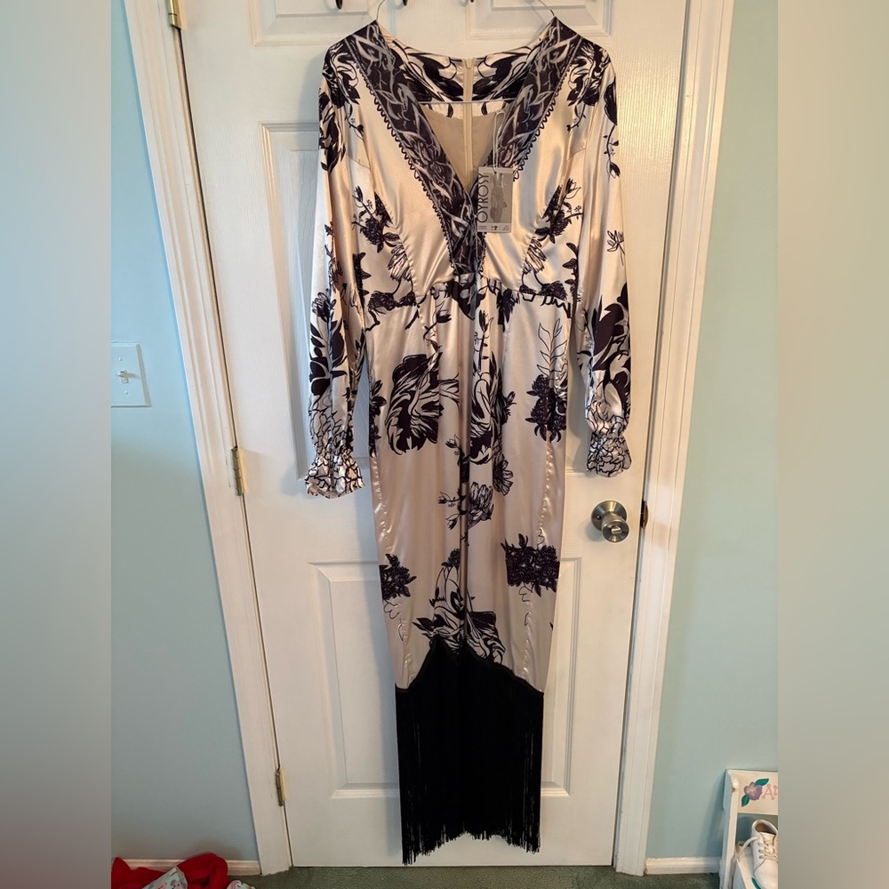 Elegant Black and Cream Floral Maxi Dress with fringe bottom.